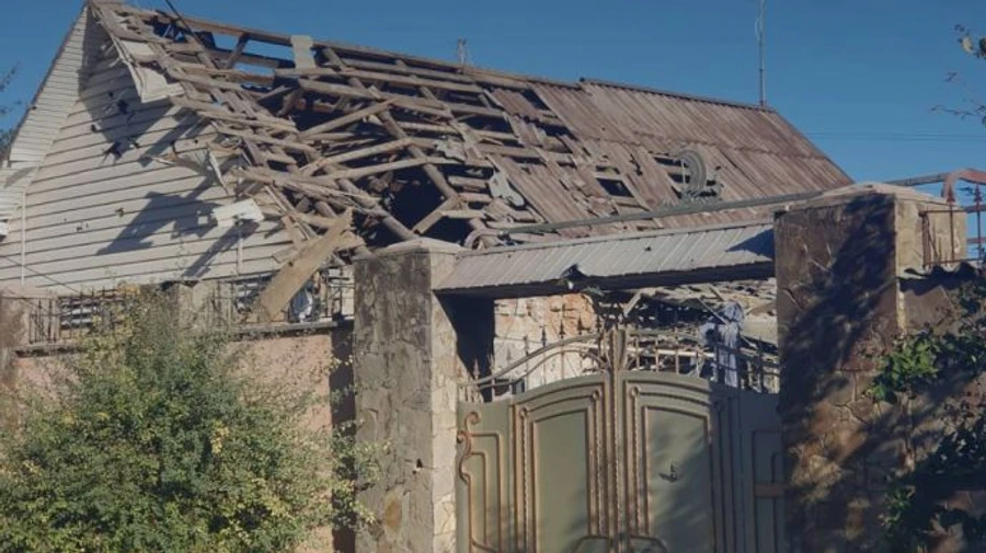 Russian forces shell Kherson, damaging buildings and power lines