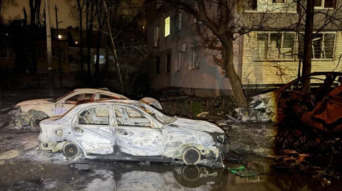 Burnt-out cars and damaged buildings: photos show aftermath of Russian attack on Dnipro