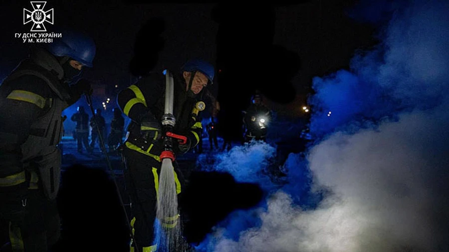 Aftermath of Russian attack on Kyiv: apartment, cars and trolleybus lines damaged