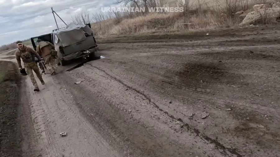 Russian drone targets car carrying journalist and soldiers in Kharkiv Oblast – photos, video