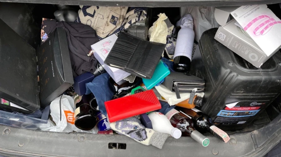 Деньги, алкоголь, украшения: в Киевской области задержали мародеров