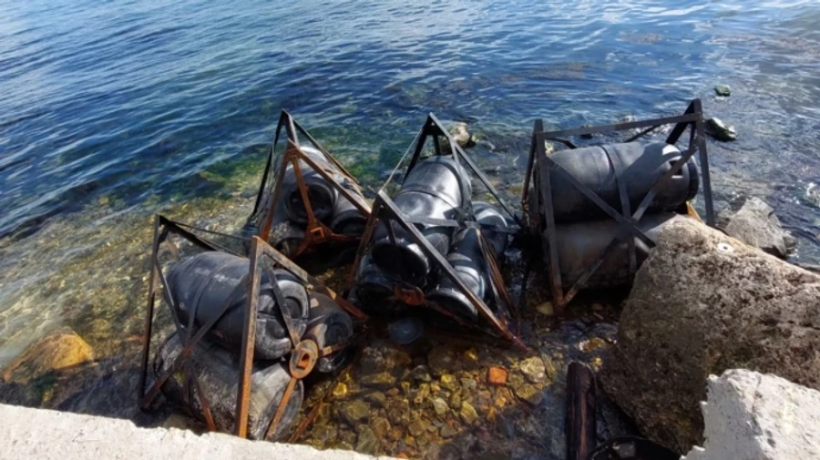 Kerch bridge barrier installed against drones washed ashore – photos