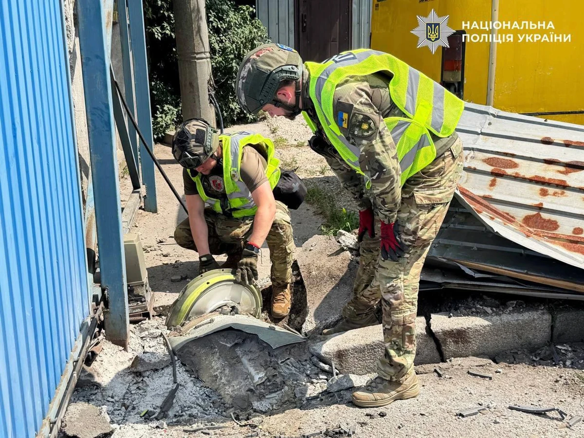 Bomb disposal experts from Ukraine's Ministry of Internal Affairs examining debris from an S-400 surface-to-air missile that either failed to detonate or was intercepted on 14 July 2026
