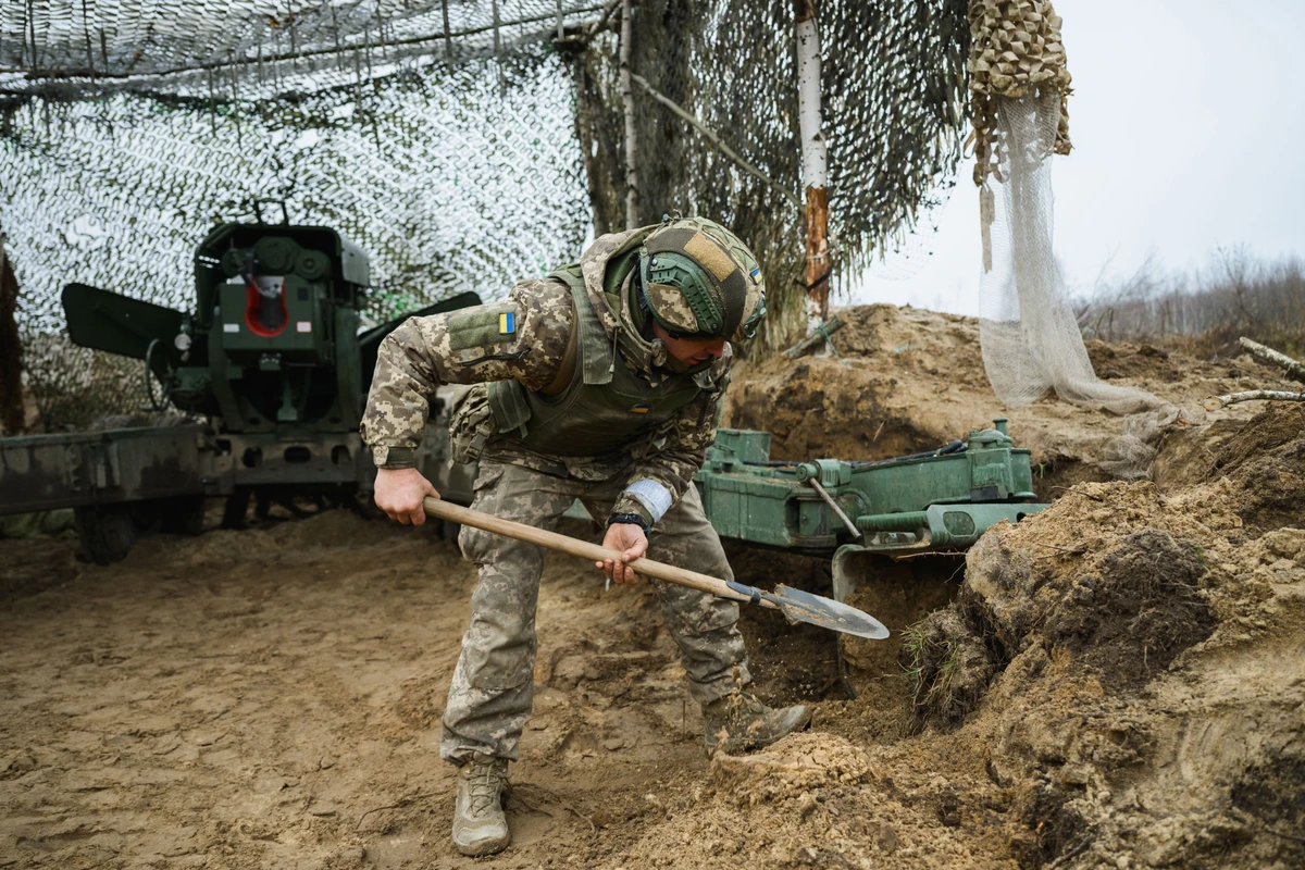 Enemy drone strikes force troops to prepare gun positions manually.