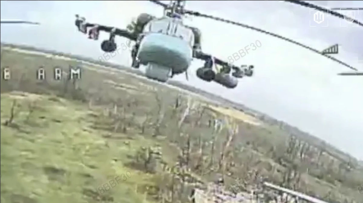 A Russian Ka-52 helicopter hit by a Ukrainian fibre-optic FPV drone