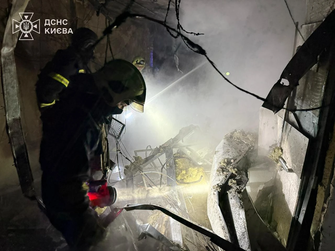 Firefighters working at the site of the attack. Photo: SES