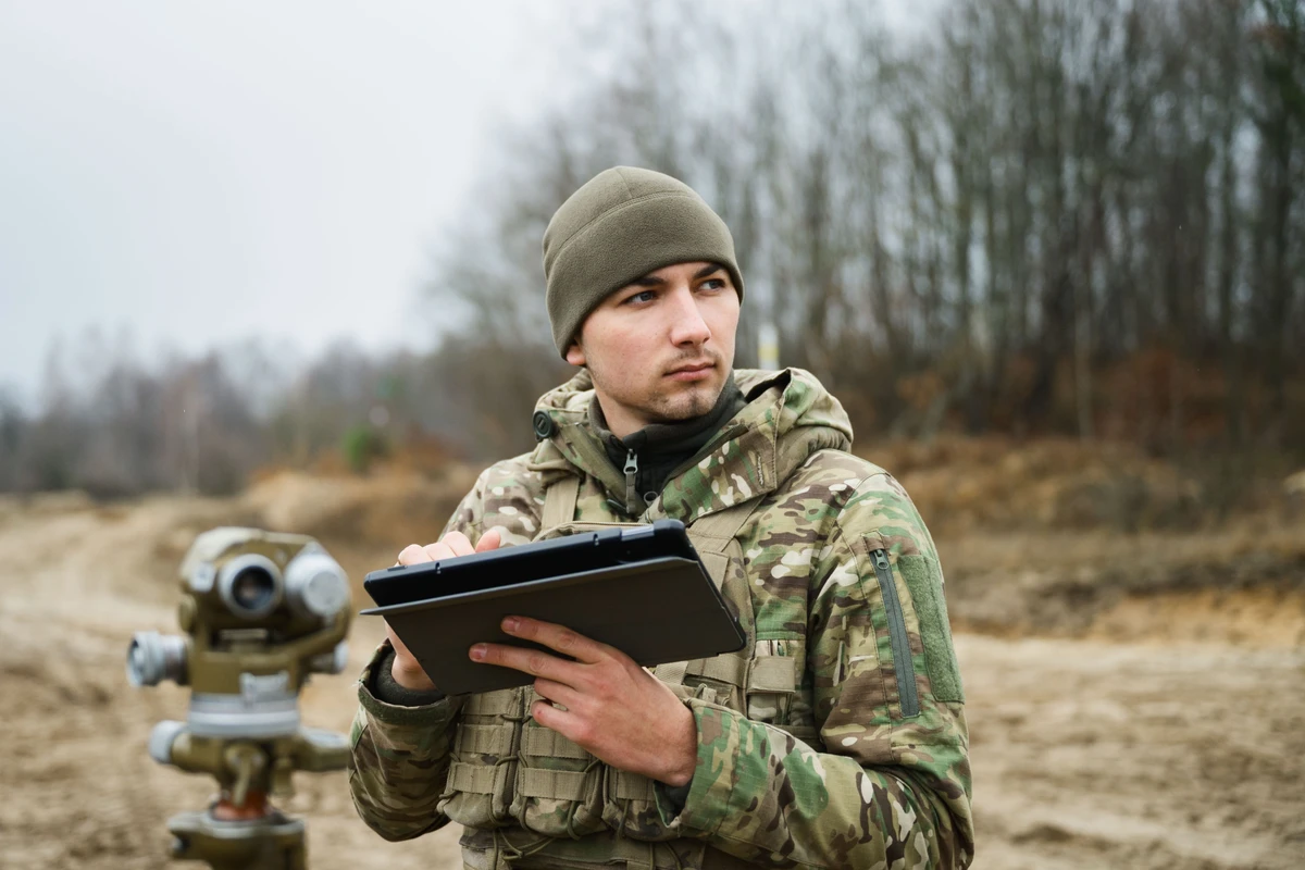 The chief of staff of the 147th Separate Artillery Brigade's battalion, Volodymyr, monitors the effectiveness of his crews during coordination.