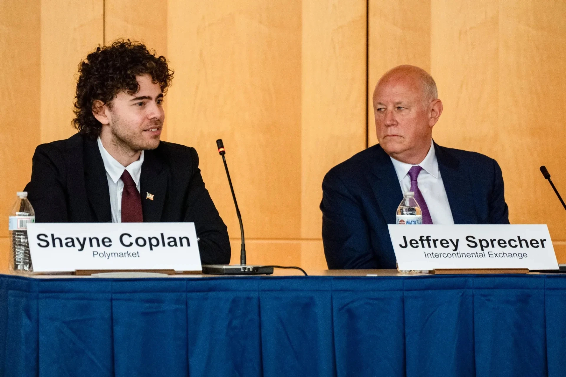 Shayne Coplan and Jeffrey Sprecher, Chairman of the New York Stock Exchange.