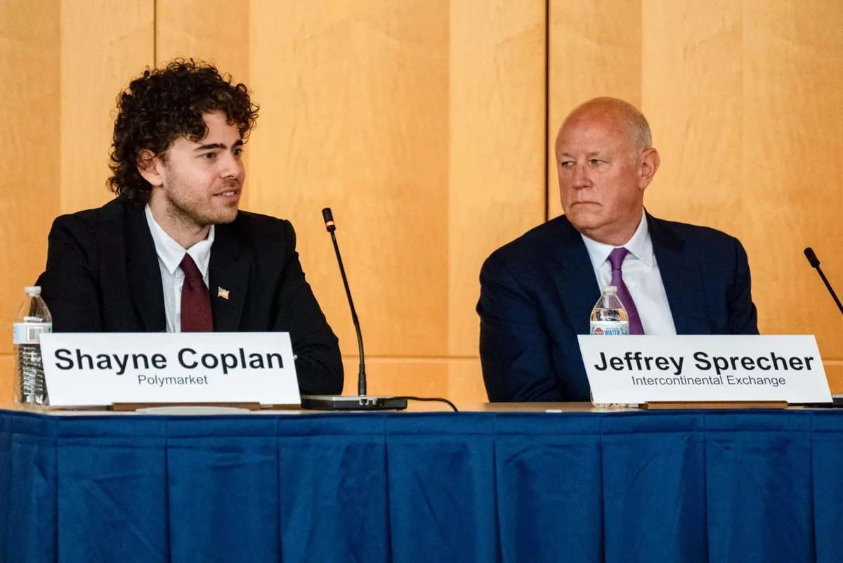Shayne Coplan and Jeffrey Sprecher, Chairman of the New York Stock Exchange.