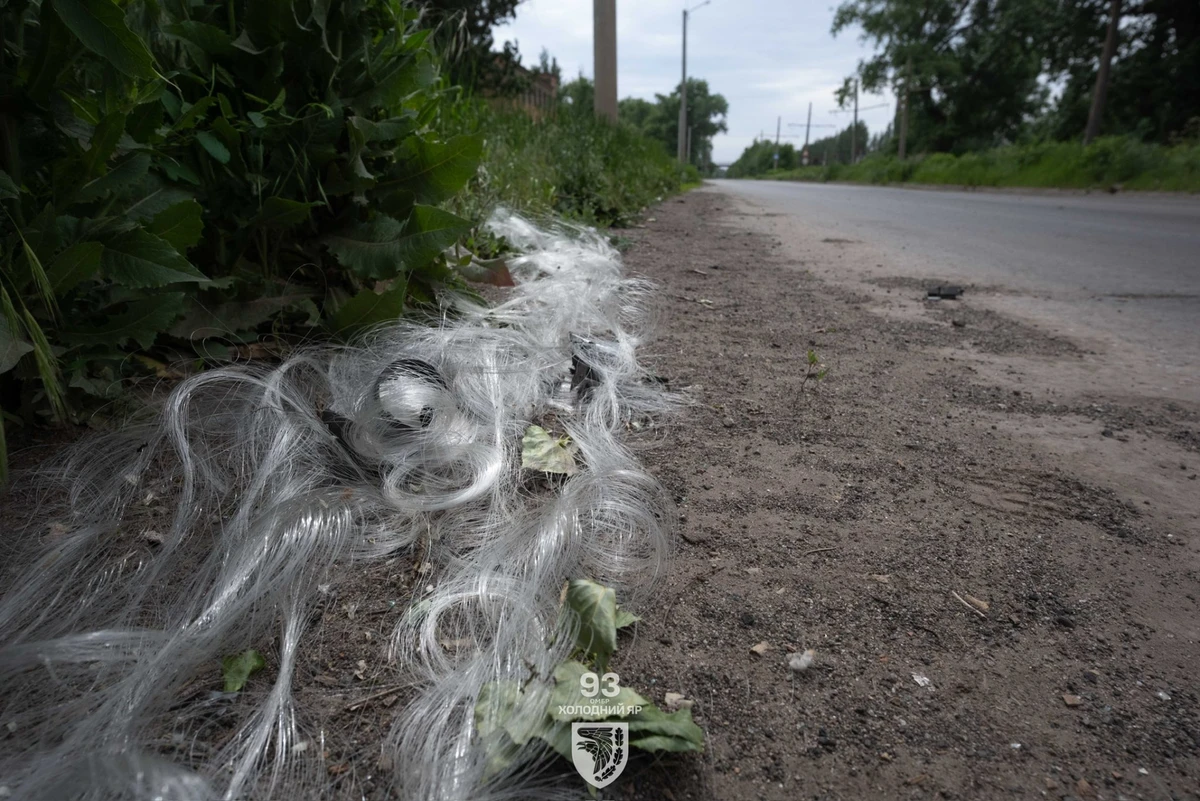 Piles of fibre-optic cable by the roadside in Kostiantynivka.