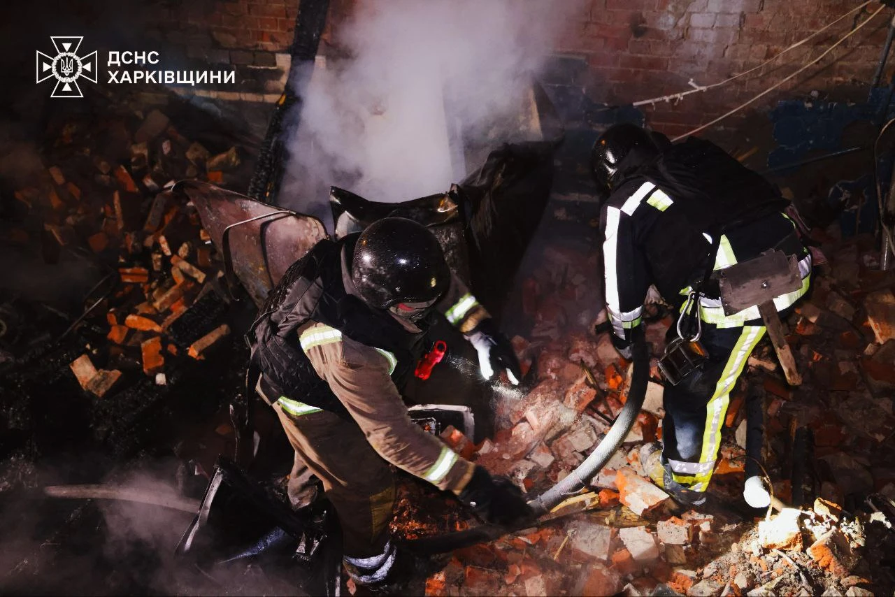Firefighters extinguishing fire