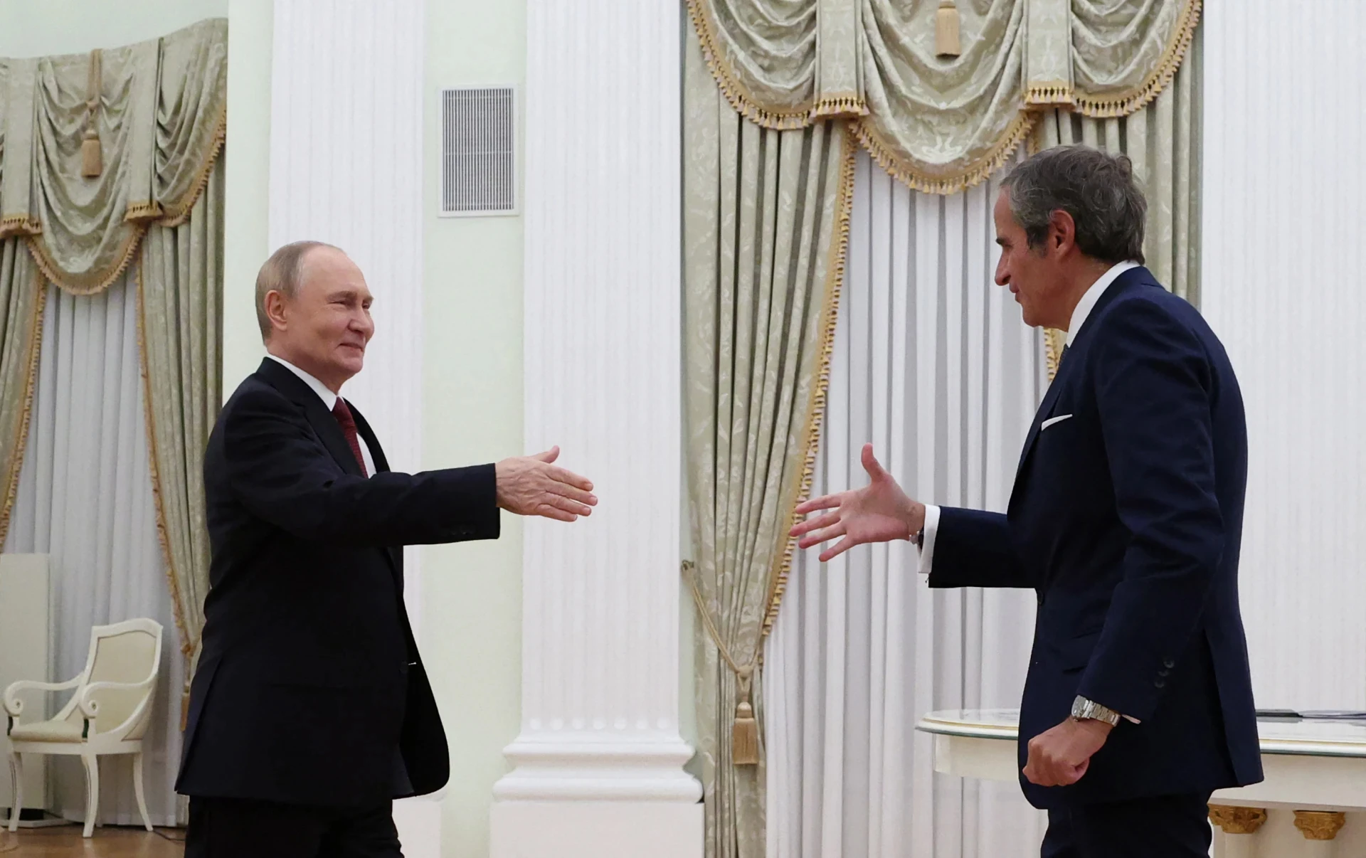 Kremlin leader Vladimir Putin and IAEA Director General Rafael Grossi. Photo: Getty Images