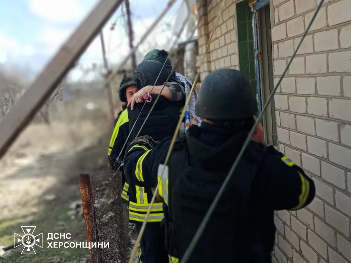 Emergency workers providing assistance in Bilozerka.