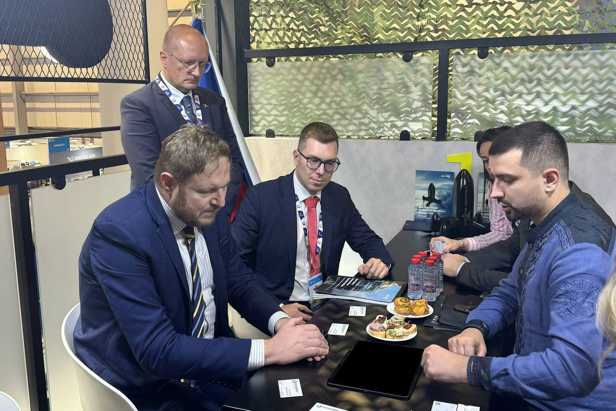 The agreement being signed.