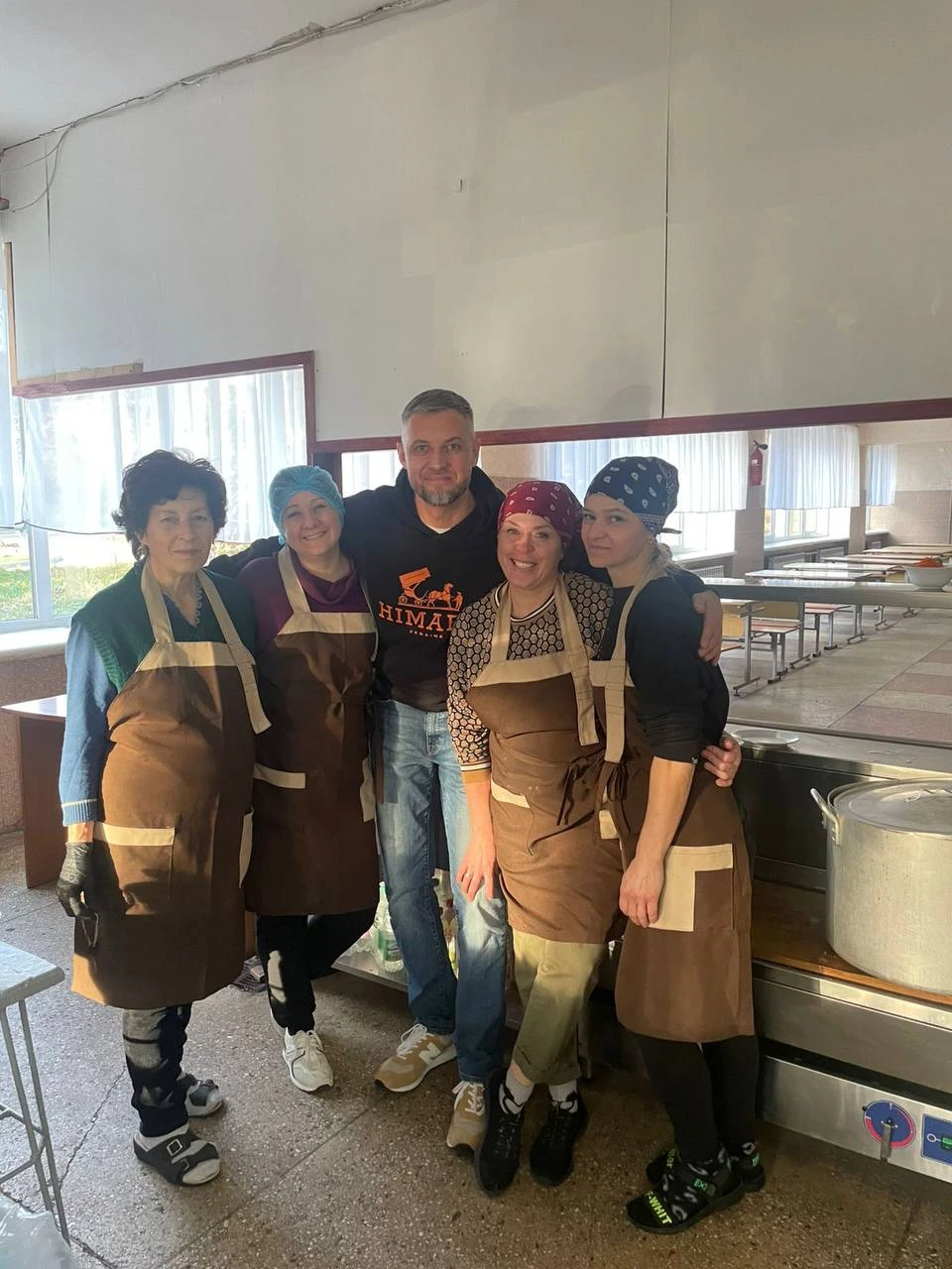 Dmytro with his employees.