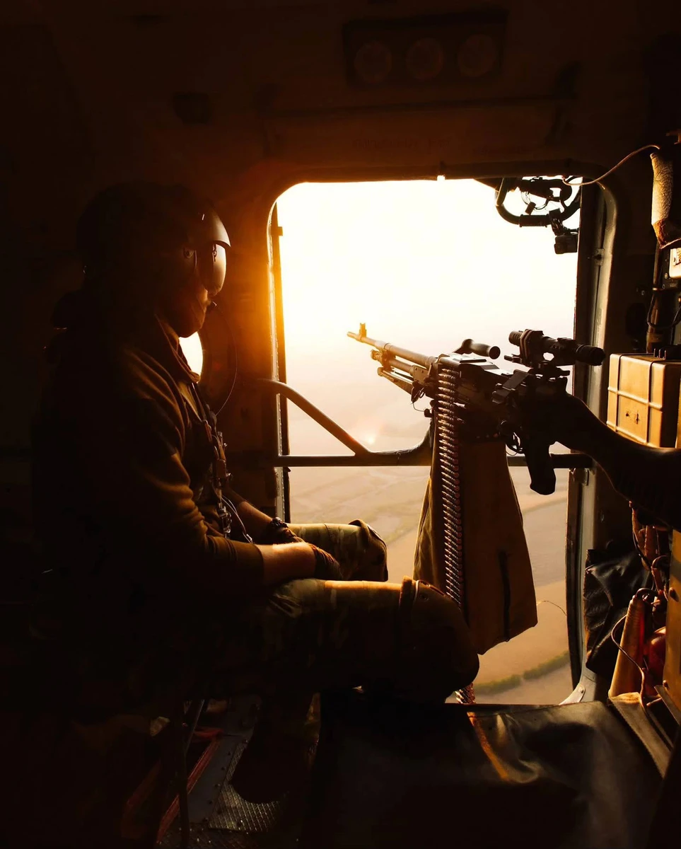 An air gunner on a Ukrainian Mi-8 at work