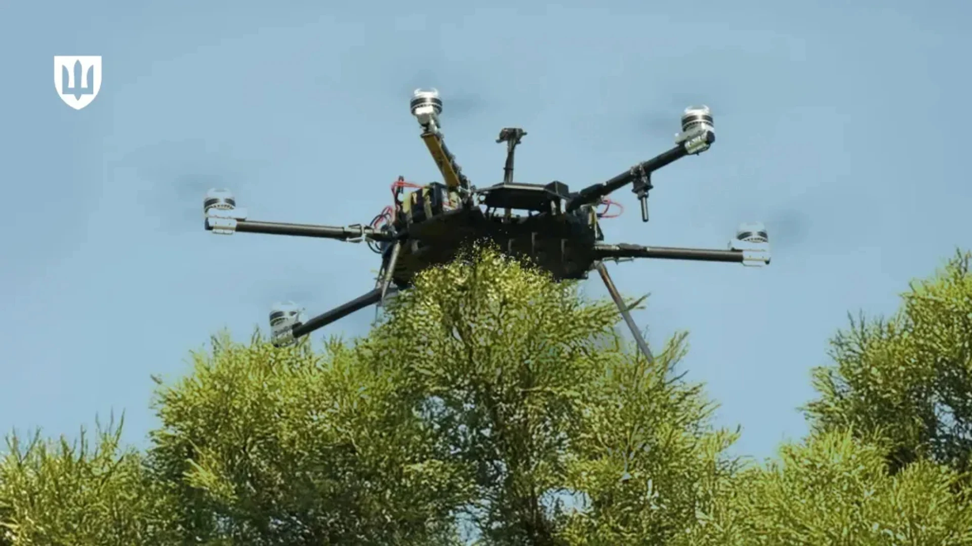 A R-34-T quadcopter drone equipped with a laser guidance system from FRDM.