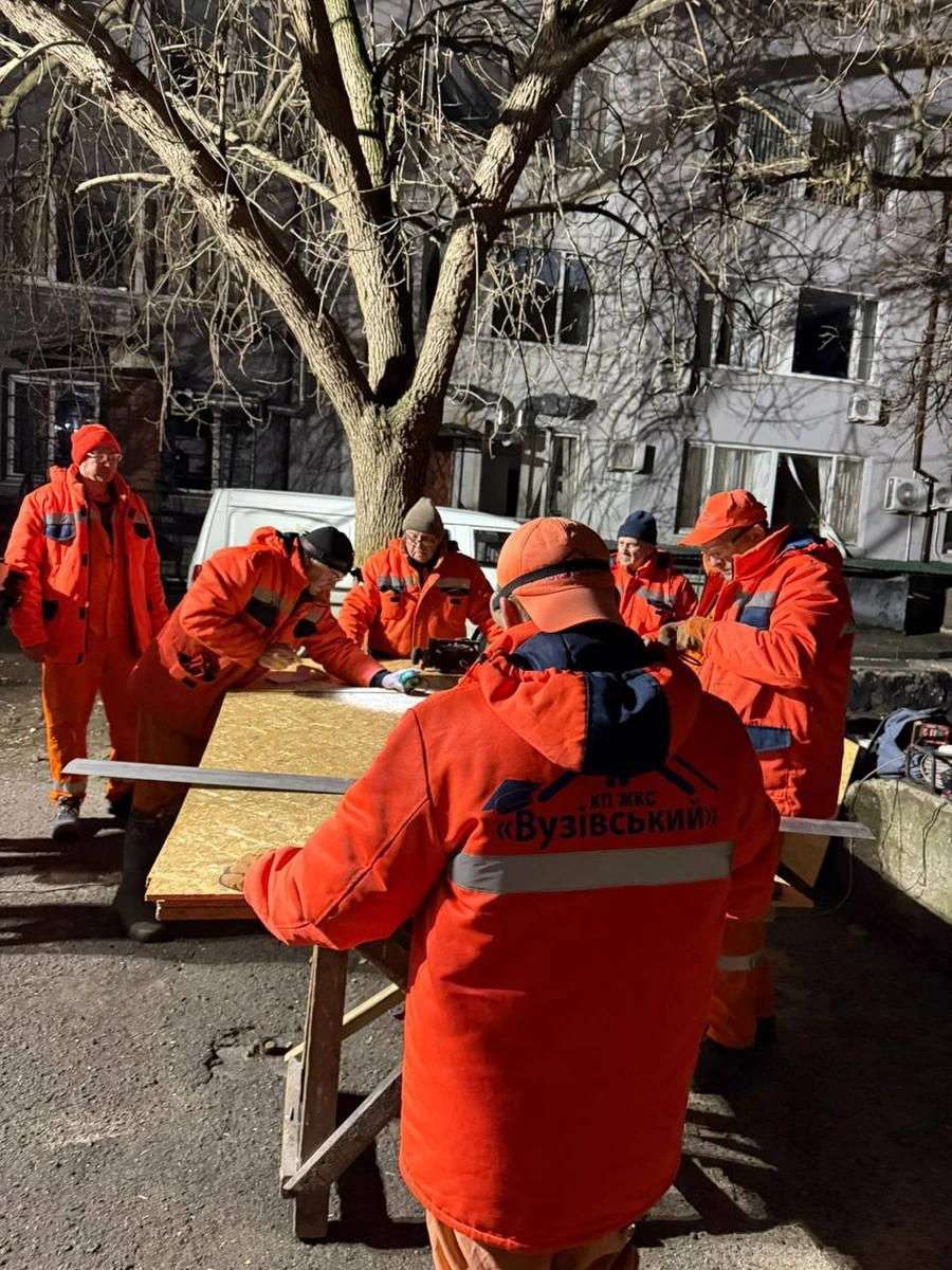 Utility workers at the scene