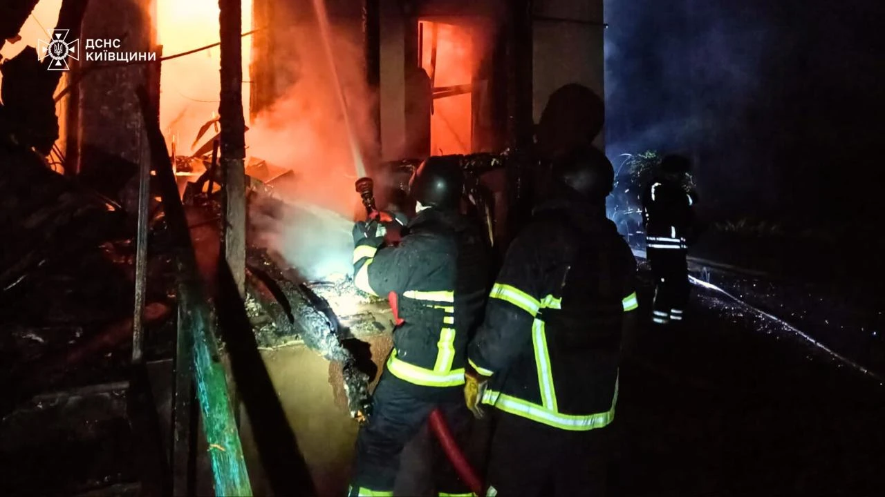 Firefighters extinguishing the fire