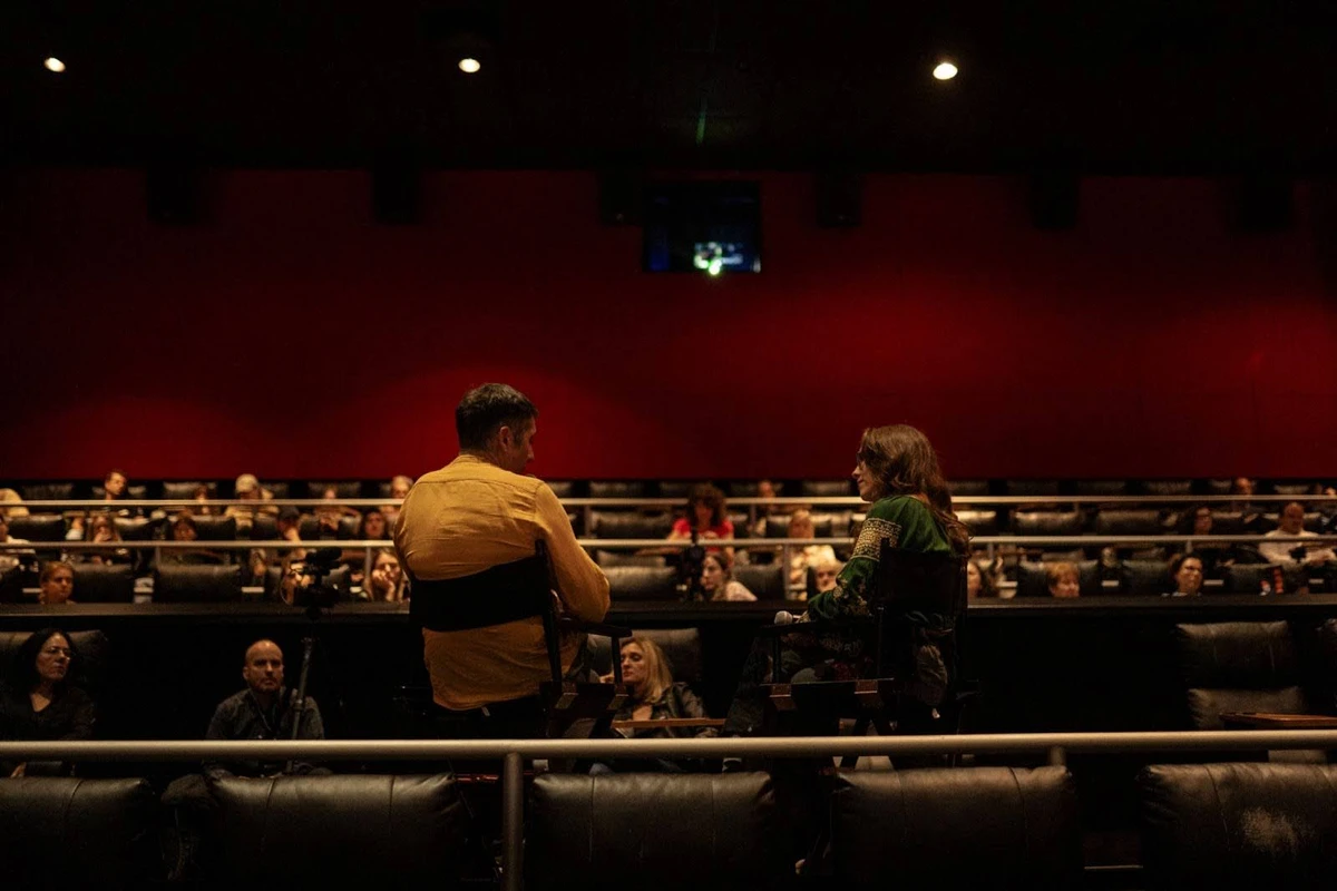 Journalist Kateryna Lisunova moderates a conversation with director Roman Bondarchuk