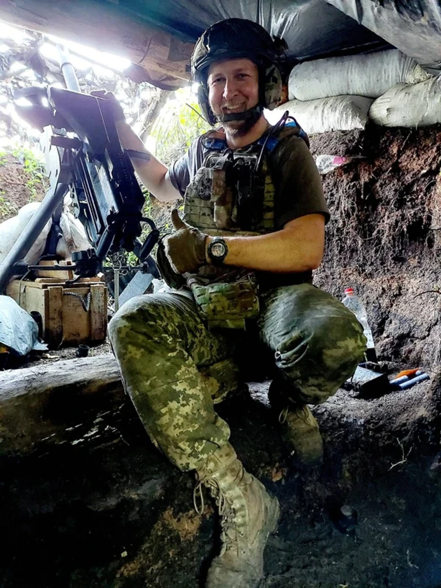 The company commander at a firing position.