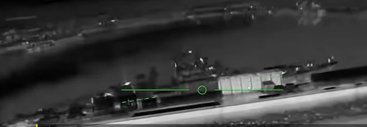 The ship at the quay as seen through an attack drone's optics. Approaching at the waterline from the side allows the drones to bypass the upper hemisphere, which is covered by the ship's air defences