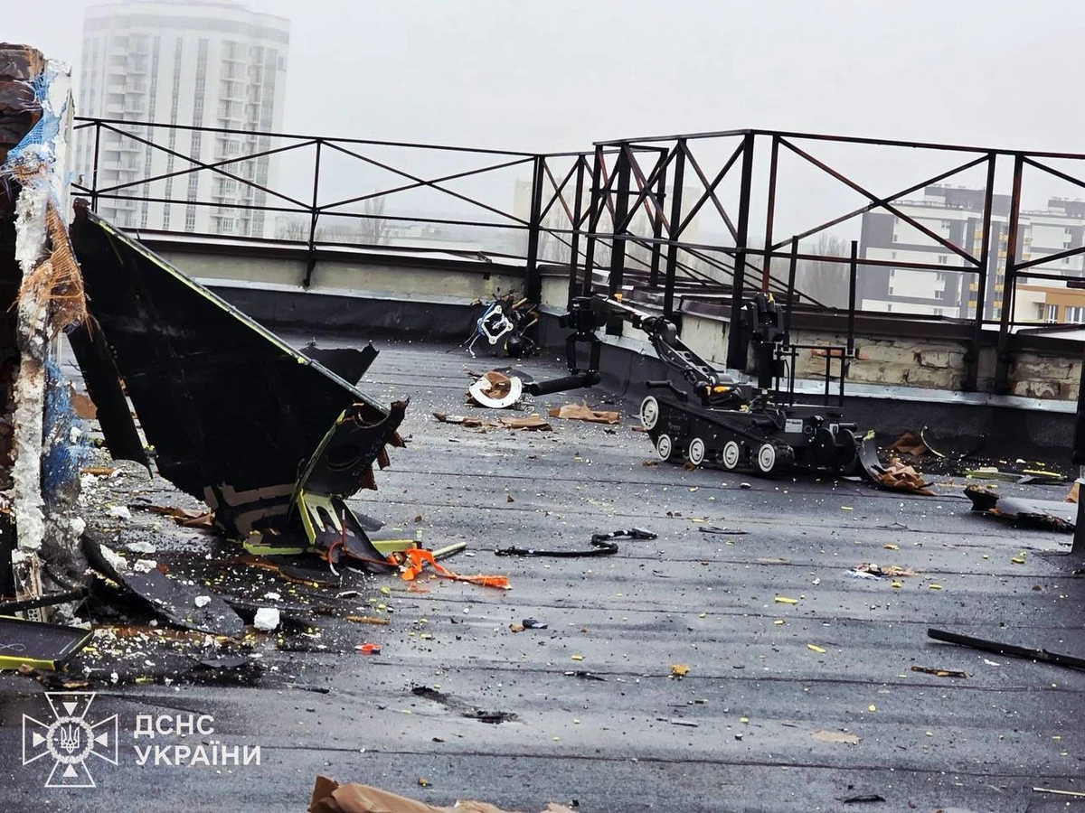 The robot collecting the explosive objects.