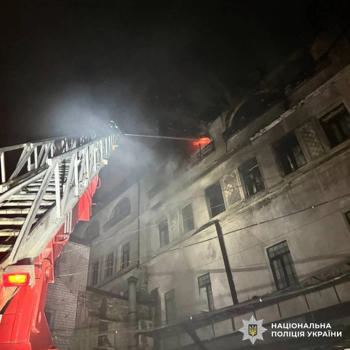 Firefighters extinguishing the fire