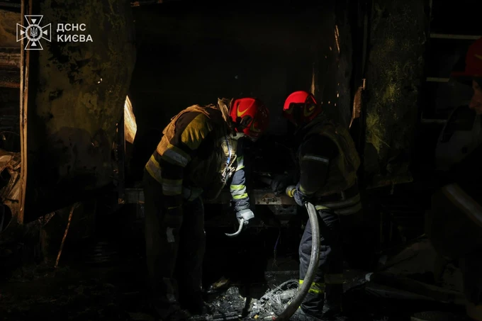 Firefighters extinguishing fire