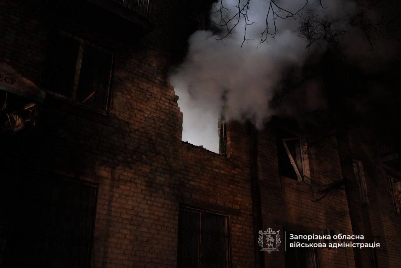 Smoke coming out of the window.