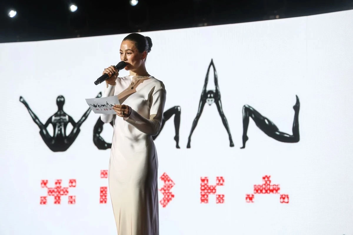 Dancer Maryna Mazepa, awardee in the Creative Industries category, spelled out the word WOMAN using letters formed by her body