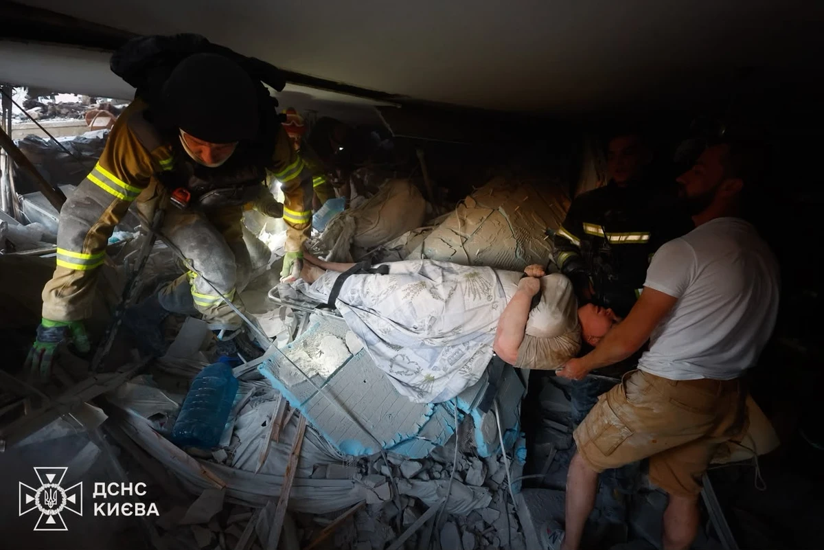 A woman being rescued
