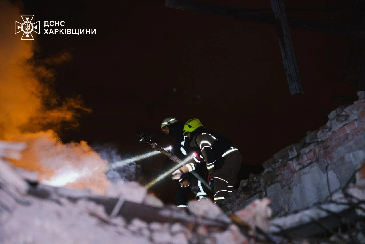 Firefighters extinguishing fire