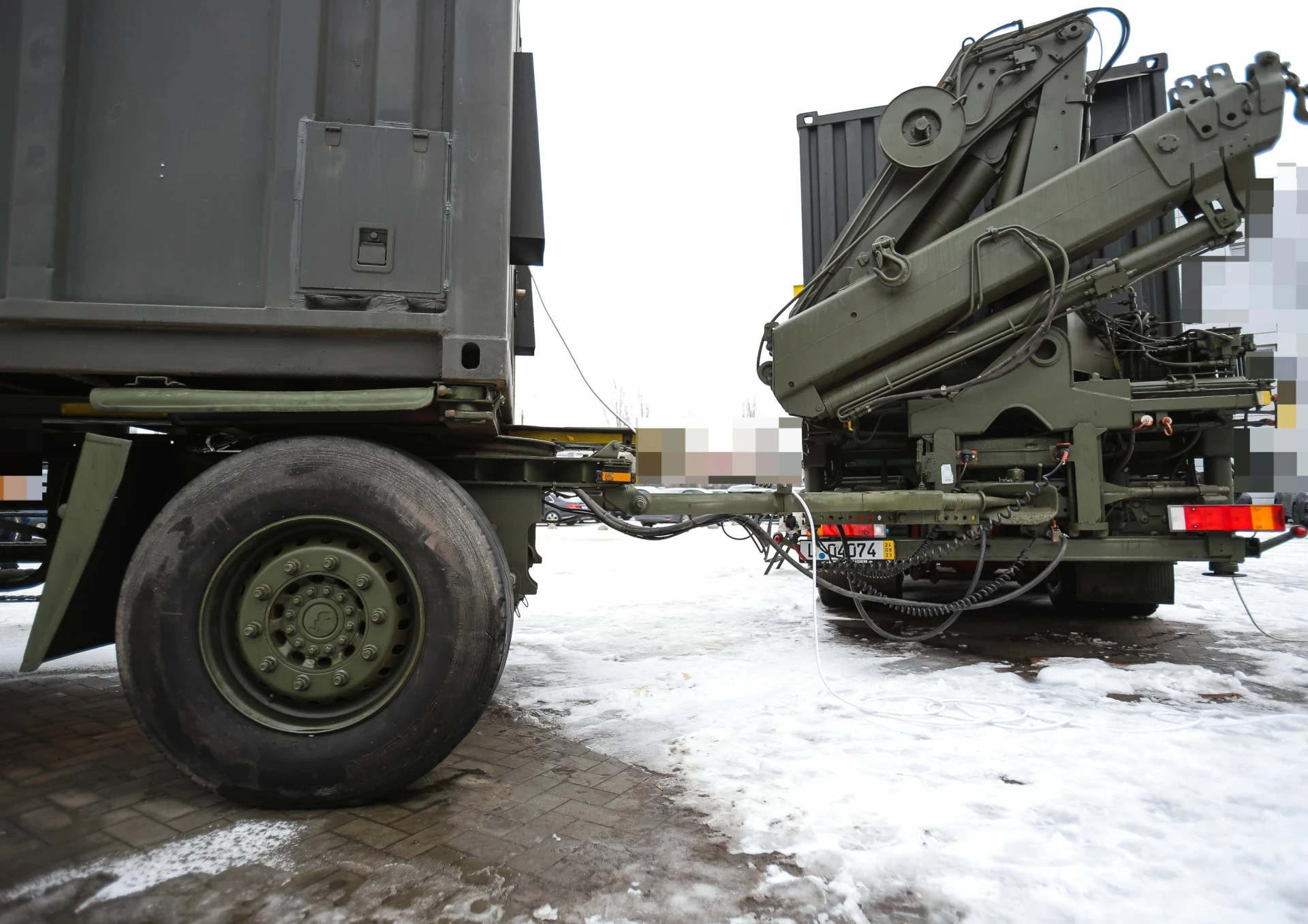 Mobile repair workshop with tyre-fitting unit and loader crane in the 43rd Artillery Brigade.