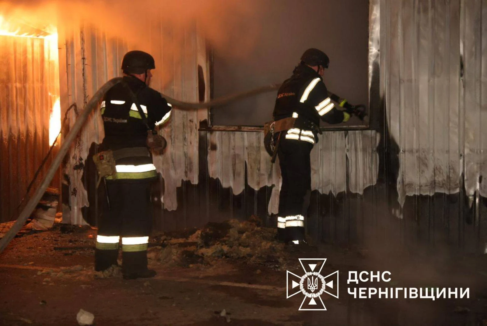 Firefighters extinguishing fire