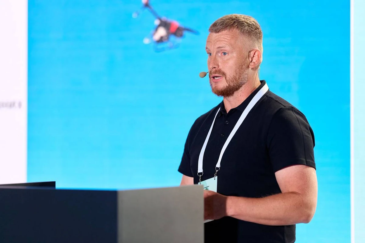 Giving a speech at a grant programme event.