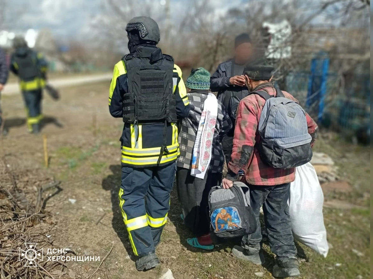 Emergency workers providing assistance in Bilozerka.