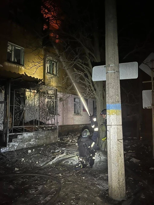 Firefighters extinguishing the fire