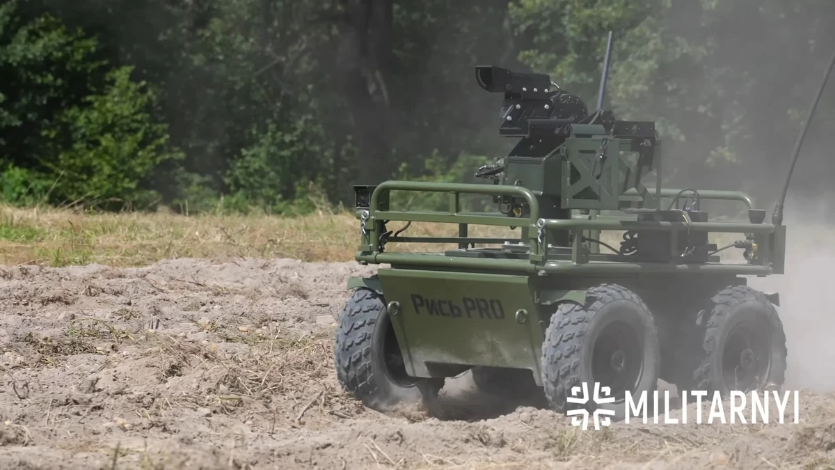 A Lynx Pro UGV carrying a Shablia combat module equipped with an Mk 19 grenade launcher at the IRON DEMO 2025 exhibition.
