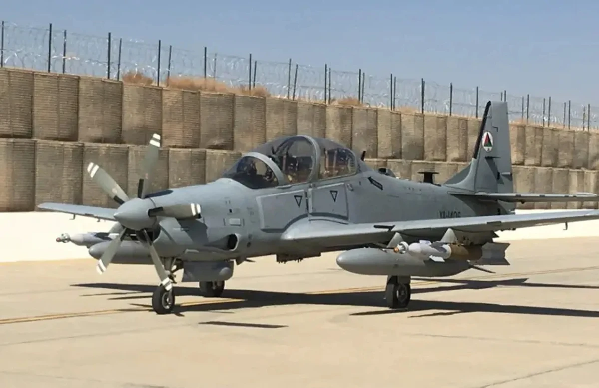 An A-29 Super Tucano light attack aircraft of the Afghan Air Force carrying a Paveway-equipped bomb load.