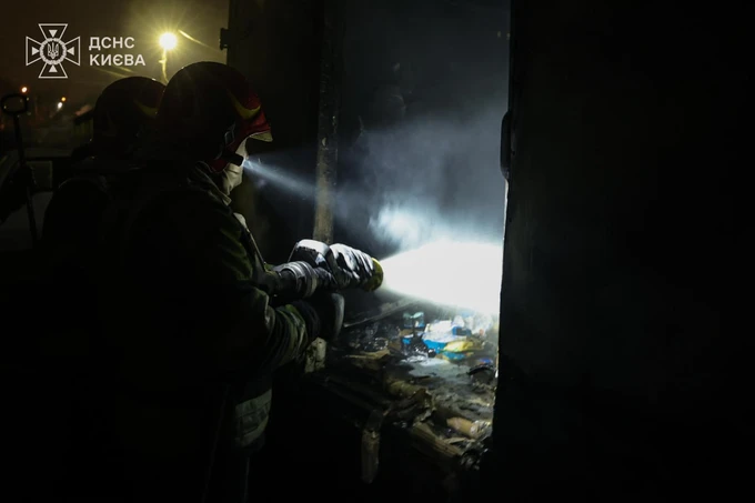 Firefighters extinguishing fire