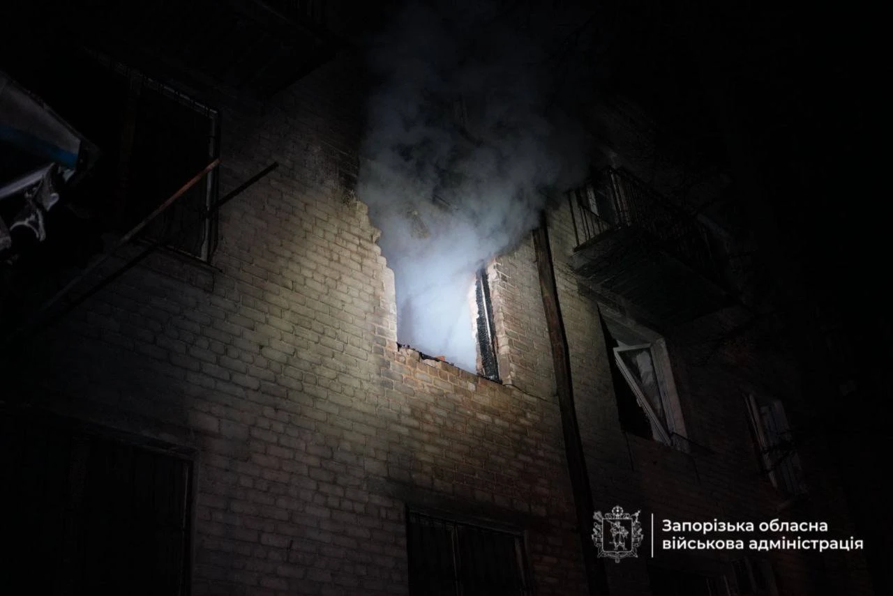 Smoke coming out of the window.