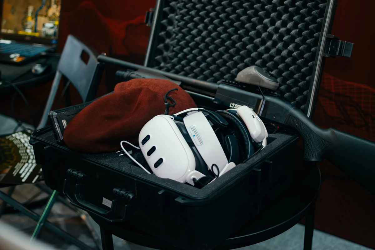 VR goggles and a dummy pump-action shotgun