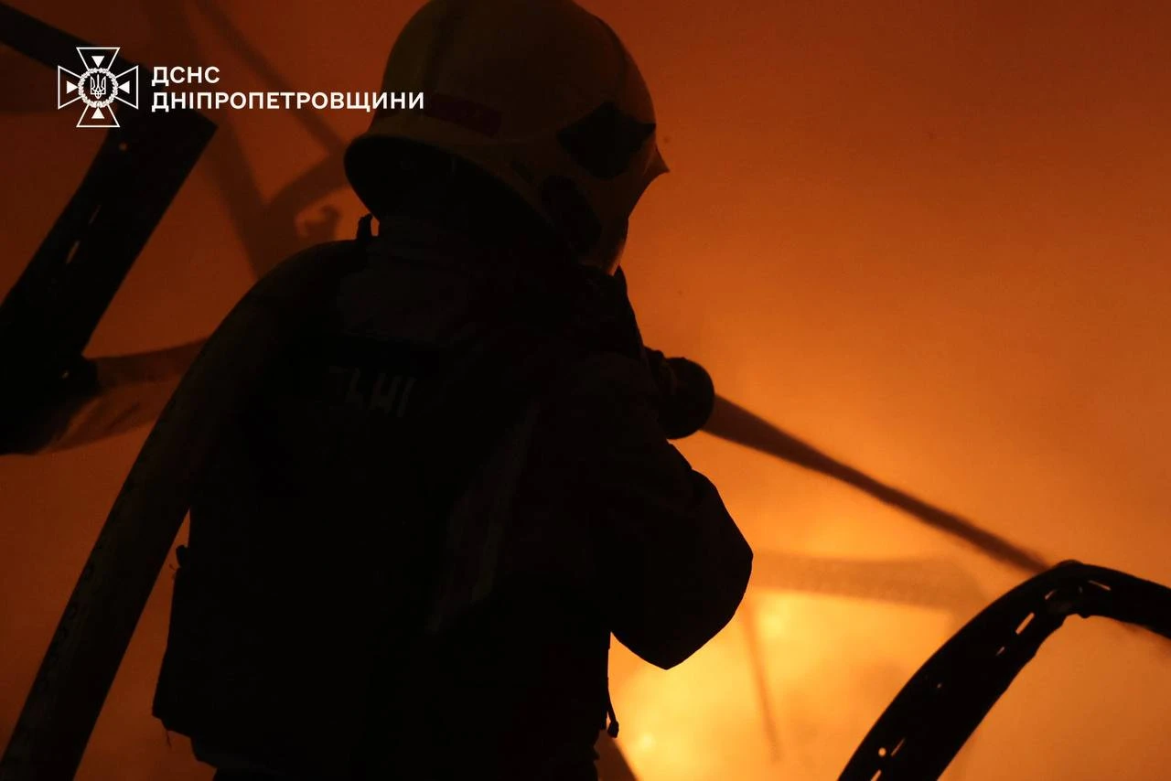 Firefighter extinguishing the fire.