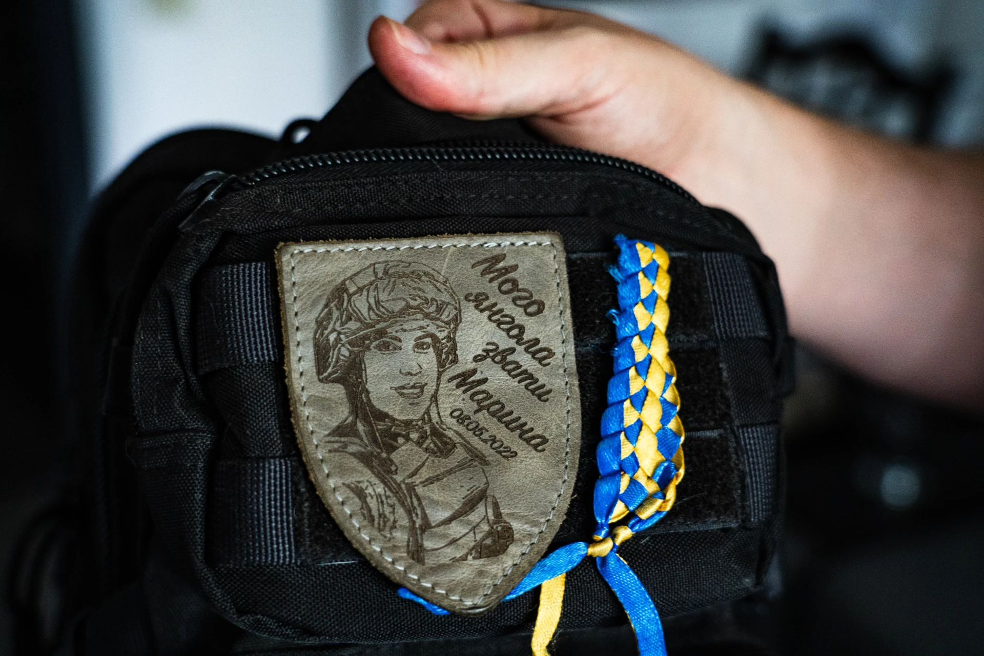The patch honouring Aleksyuk on the tactical bag that Ivanchenko carried while fleeing Russian occupation in Berdiansk. Photo: Natalie Berry