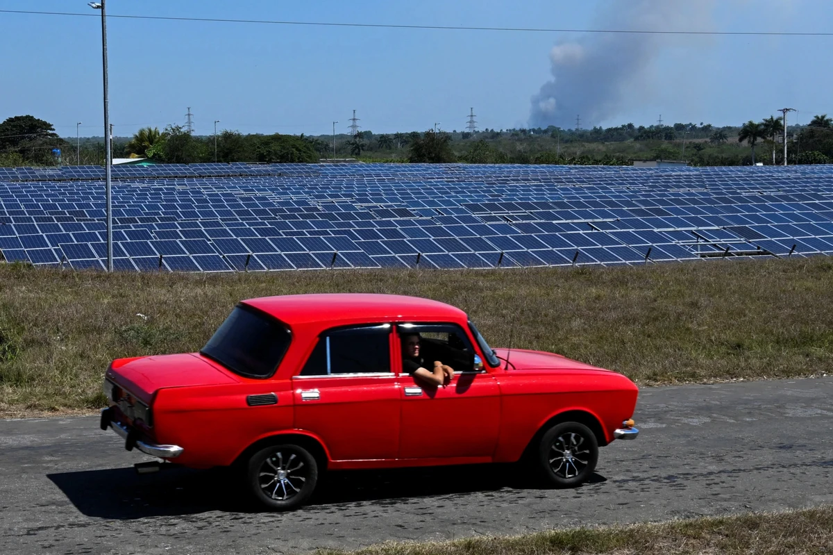 Solar panels from China may be Cuba’s only real chance to cut its dependence on oil. In the background, the skeletal remains of a Soviet-era nuclear power plant, which was never completed