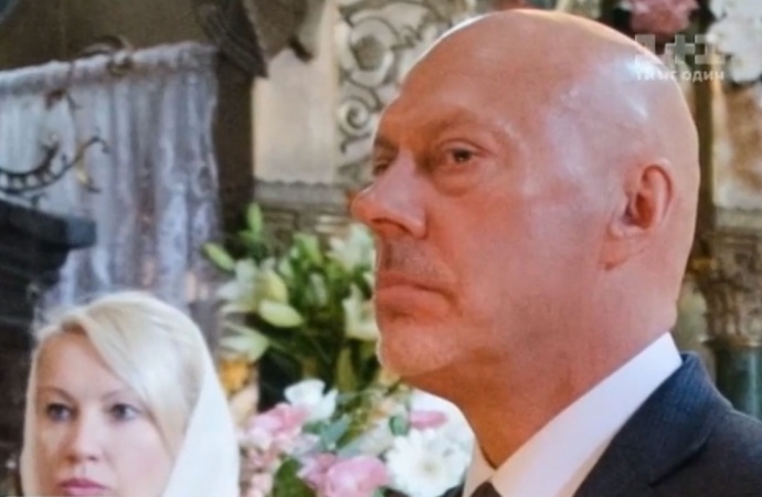 скріншот з сюжету 1+1 про хрестини онучки Тимошенко